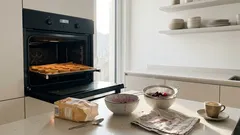 Mini-Smetanniki in Tartalettes: schnelles Dessert mit gefrorenen Beeren, das nicht wässrig wird